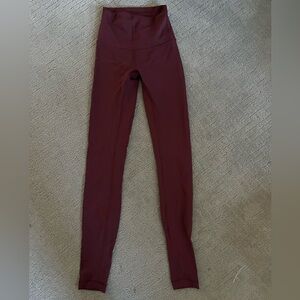 Lululemon Athletica maroon plum Leggings. Size 0. Length is 28”